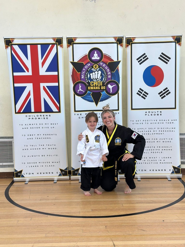 Young student with Head Instructor at Milton Keynes Choi Kwang Do
